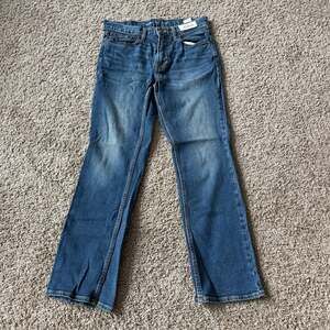 Size 38x32 Light wash Barbell jeans Relaxed stretchy...